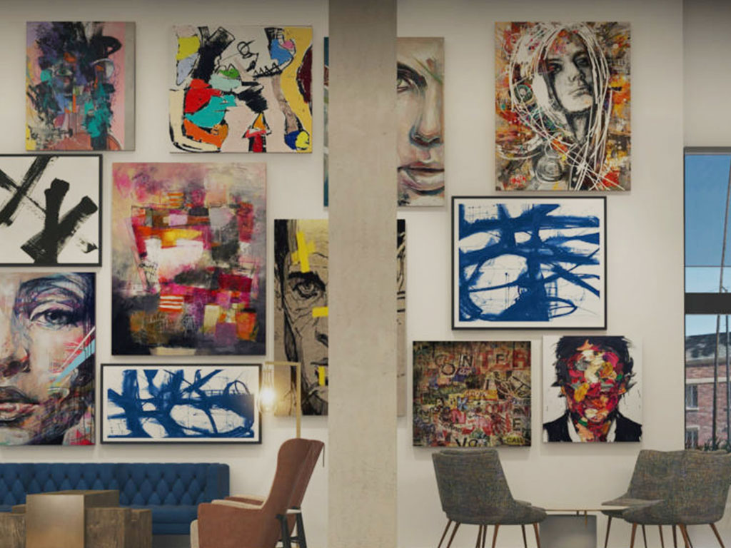 Contemporary paintings hung on the art gallery wall in the lobby at The Glenmark Hotel, Glendale